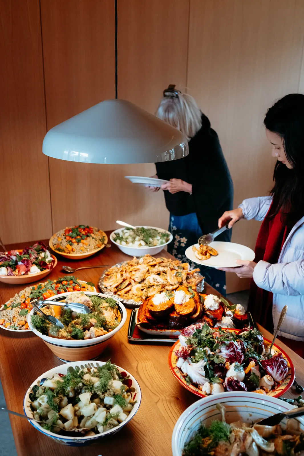 Guests at a long shared table.